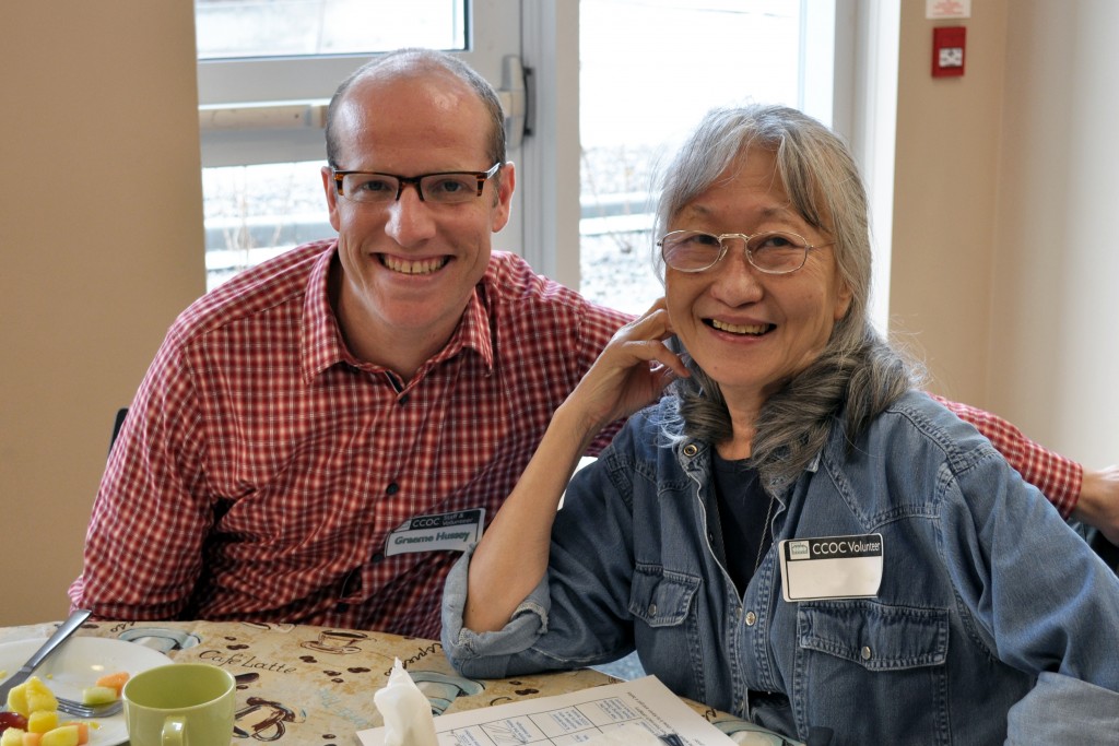 A CCOC staff member and volunteer at a volunteer recognition event